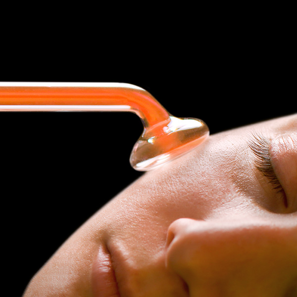 close-up of woman receiving an ultrasound facial